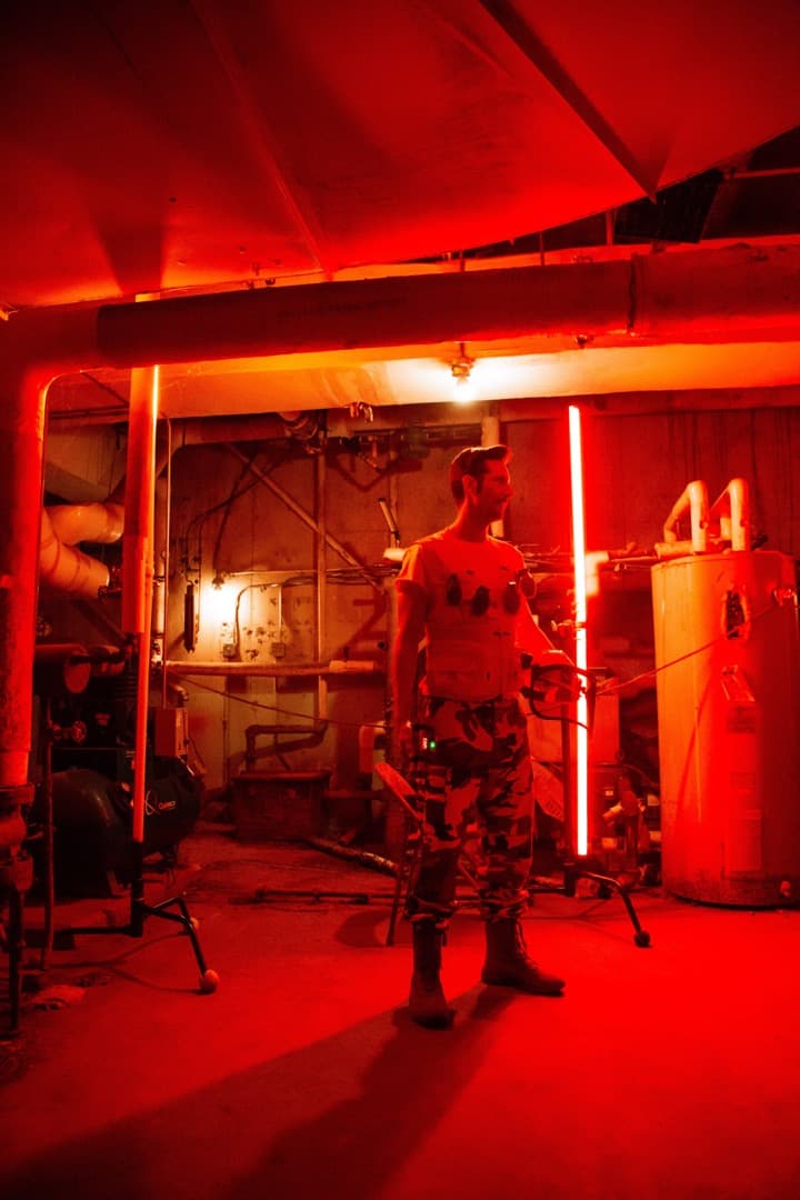 Behind the scenes photo 33 from Clone Cops production showing phillip cordell prepares for a scene in the boiler room